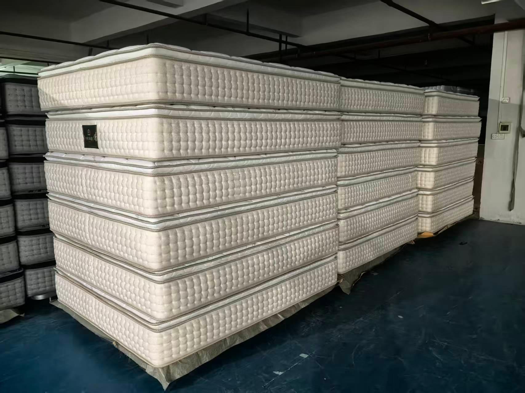 Flat compressed mattresses stacked for wholesale-mattress bulk supply
